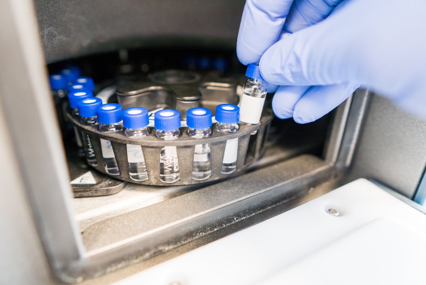 Scientist running in-process analytical testing services